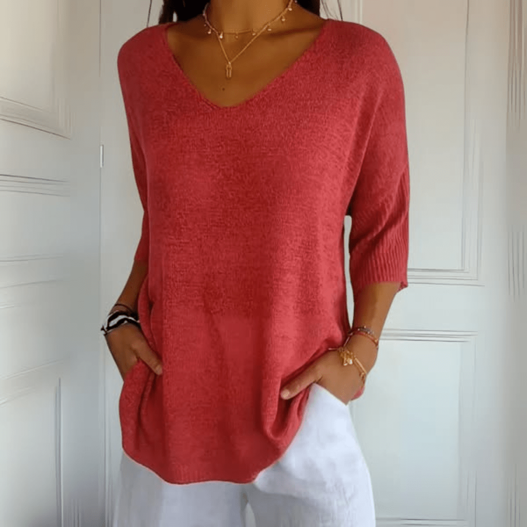Dzianinowy sweter damski z dekoltem V – luźny, rękaw 3/4